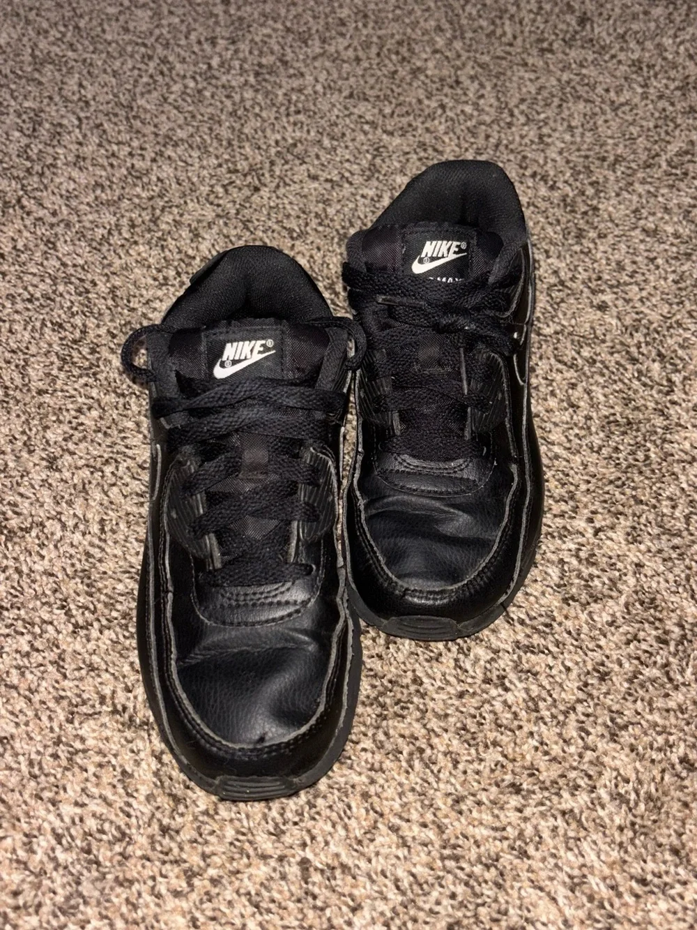 Nike Kids Black Low-Top Sneaker with Subtle Swoosh